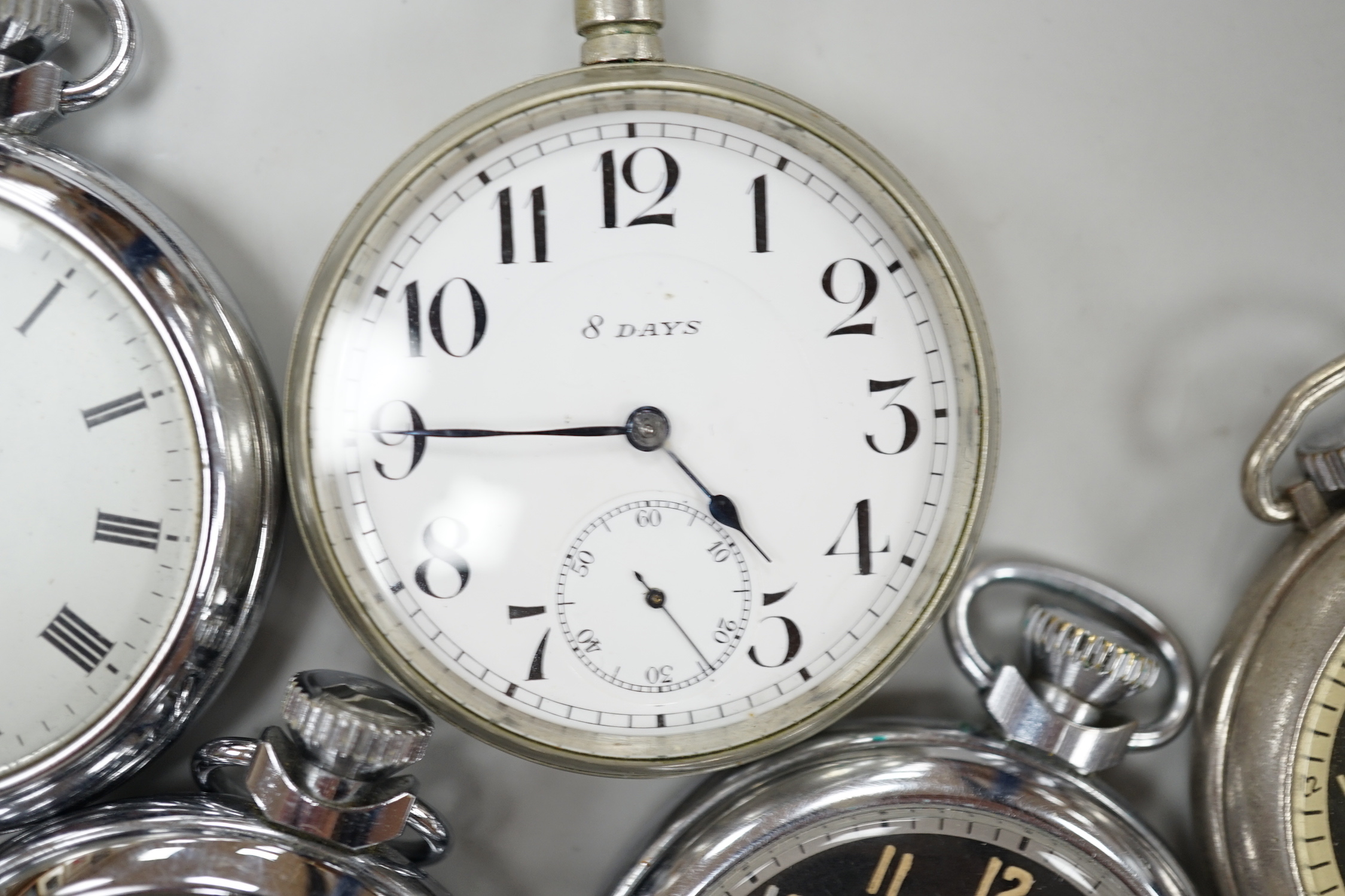 Ten assorted base metal pocket watches including Ingersoll and Smiths.